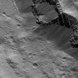 This image of landslides along Occator Crater's wall on Ceres was obtained by NASA's Dawn spacecraft on July 16, 2018 from an altitude of about 47 miles (76 kilometers).
