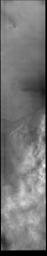 This image from NASA's Mars Odyssey shows a layer of clouds over the South polar cap.