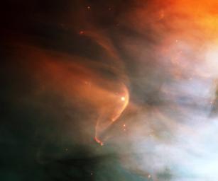 This image, taken by the Hubble Space Telescope, shows a bow shock around a very young star, LL Ori.