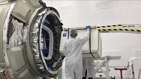 This image shows NASA's Cold Atom Laboratory, packaged in a protective layer, being loaded up onto a Northrop Grumman (formerly Orbital ATK) Cygnus spacecraft for its trip to the International Space Station.
