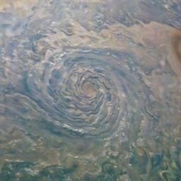 A cyclonic storm in Jupiter's northern hemisphere is captured in this image from NASA's Juno spacecraft.