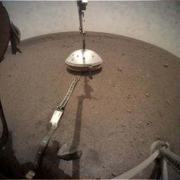 NASA's InSight lander deployed its Wind and Thermal Shield on Feb. 2, 2019 (sol 66). The shield covers InSight's seismometer, which was set down onto the Martian surface on Dec. 19, 2018.