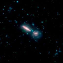 This image, by NASA's Spitzer Space Telescope, shows two merging galaxies known as Arp 302, also called VV 340.