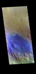 This image from NASA's Mars Odyssey shows an unnamed crater in Arabia Terra. Dark blue in this combination is typically basaltic sands.