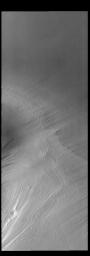 This image from NASA's Mars Odyssey shows part of the south polar cap. The cap is comprised of layers of ice and dust deposited over millions of years.