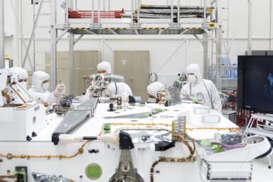 NASA's Mars 2020 engineers and technicians prepare the high-gain antenna for installation on the rover's equipment deck.