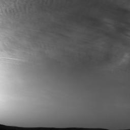 NASA's Curiosity Mars rover imaged these drifting clouds on May 7, 2019, the 2,400th Martian day, or sol, of the mission, using its Navigation Cameras (Navcams).