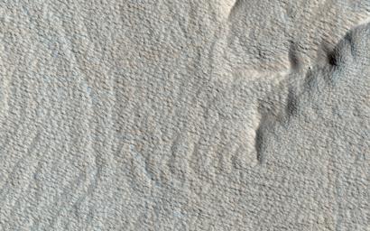 This image, acquired on October 1, 2018 by NASA's Mars Reconnaissance Orbiter, shows a wavy surface like that of the sea. These wave shapes are the result of erosion.
