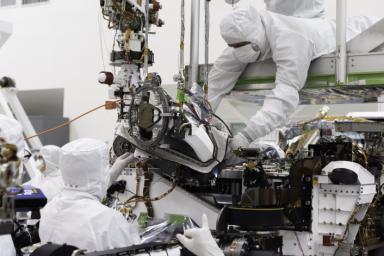 In this August 5, 2019 image, the bit carousel, the heart of sampling and caching subsystem of NASA's Mars 2020 mission, is attached to the front end of the rover.