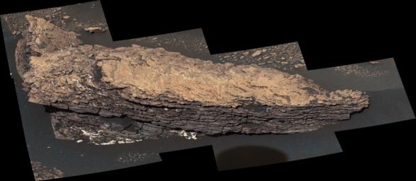 This mosaic of images shows a boulder-sized rock called 'Strathdon,' which is made up of many complex layers. NASA's Curiosity Mars rover took these images using its Mast Camera, or Mastcam.