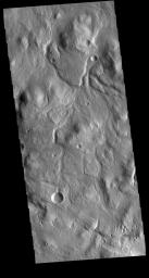 This image from NASA's Mars Odyssey shows the northern side of Acheron Fossae. Acheron Fossae is a complex tectonic region north of Olympus Mons.
