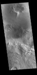 This image from NASA's Mars Odyssey shows a small field of sand dunes on the floor of Bamberg Crater.