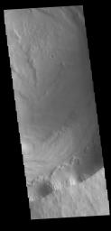 This image from NASA's Mars Odyssey shows Biblis Patera, the summit caldera of the volcano Biblis Tholus.