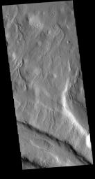 This image from NASA's Mars Odyssey shows part of the northern margin of Acheron Fossae.