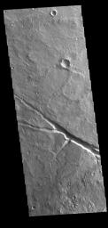 This image from NASA's Mars Odyssey shows a large enclosed basin, located in Margaritifer Terra.