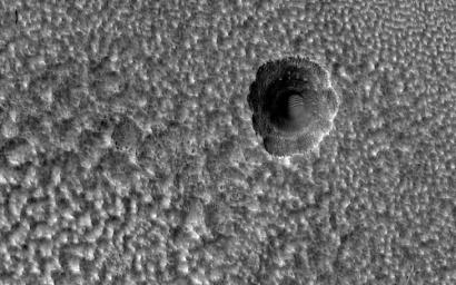 This image acquired on December 31, 2019 by NASA's Mars Reconnaissance Orbiter, shows part of the ejecta from an impact crater (about 6-kilometers in diameter) to the west in Utopia Planitia.