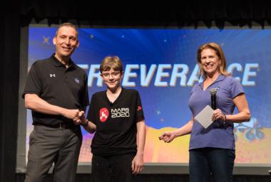 NASA's Thomas Zurbuchen and Lori Glaze congratulate Alexander Mather, the seventh grader who submitted the winning entry Perseverance to the agency's Name the Rover essay contest.