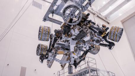 NASA's Perseverance rover is moved during a test of its mass properties at Kennedy Space Center in Florida. The image was taken on April 7, 2020.
