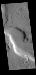This image from NASA's Mars Odyssey shows a section of one of the numerous channels that dissect the northern margin on Arabia Terra.
