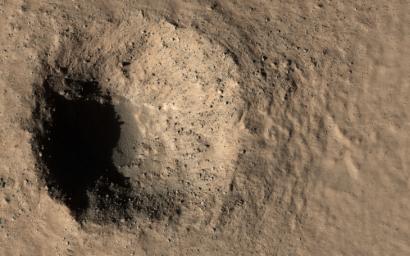 This image acquired on March 18, 2020 by NASA's Mars Reconnaissance Orbiter, shows two different targets at once, a geologically-young crater and a small even younger one.