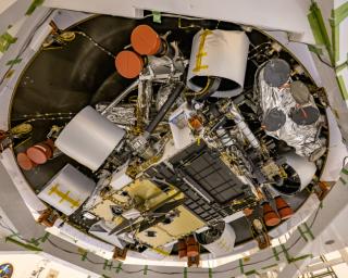 NASA's Mars Perseverance rover's descent stage was recently stacked atop the rover at Kennedy Space Center, and the two were placed in their back shell.