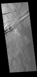 This image from NASA's Mars Odyssey shows part of Albor Fossae. These fossae (graben) are located on the southeastern flank of Albor Tholus, one of the volcanoes of the Elysium volcanic complex.