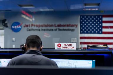 Flight Director Matt Smith studies the data during the second post-launch trajectory correction maneuver during Perseverance's cruise to Mars.