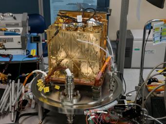 This engineering model of Mars Oxygen In-Situ Resource Utilization Experiment (MOXIE) instrument is about to undergo vibration testing in a lab at the Jet Propulsion Laboratory in Pasadena, California.