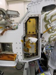 This image, taken in the clean room at NASA's Jet Propulsion Laboratory in Southern California, shows the Radar Imager for Mars' Subsurface Experiment (RIMFAX) electronic's box after it has been inserted into the Perseverance rover.