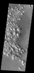 This image from NASA's Mars Odyssey shows part of Atlantis Chaos. Chaos terrain is typified by regions of blocky, often steep sided, mesas interspersed with deep valleys.