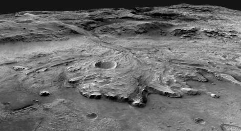 Oblique view looks to the west above Jezero Crater floor over the fan-shaped delta and into the valley that cuts through the crater rim. The illustration was generated by U.S Geological Survey using data from NASA spacecraft.