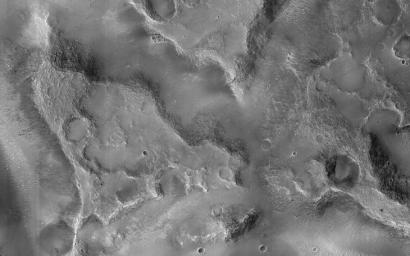 This image acquired on November 14, 2020 by NASA's Mars Reconnaissance Orbiter, shows a crater in Xanthe Terra filled with material deposited by wind or water after the crater formed.