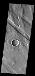 This image from NASA's Mars Odyssey shows Claritas Fossae, a graben filled highland located between the lava plains of Daedalia Planum and Solis Planum.
