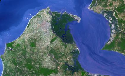 NASA's Terra spacecraft shows Banjul, the capital of The Gambia; it is located on St. Mary's Island, where the Gambia River enters the Atlantic Ocean in western Africa.