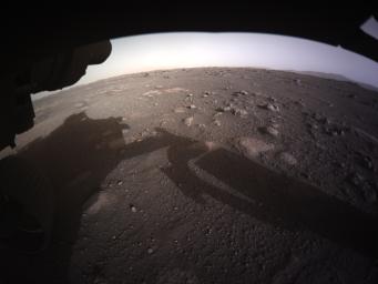 This is the first high-resolution, color image to be sent back by the Hazard Cameras (Hazcams) on the underside NASA's Perseverance Mars rover after its landing on Feb. 18, 2021.