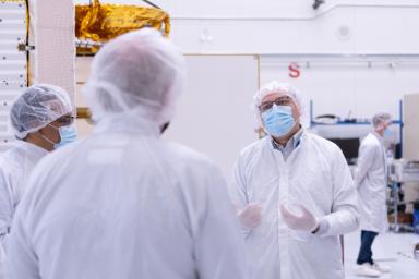 Project Manger Parage Vaze stands in the JPL clean room where the SWOT satellite is being assembled. The spacecraft will help researchers survey the amount and distribution of Earth's surface water, including lakes and rivers, as well as the ocean.