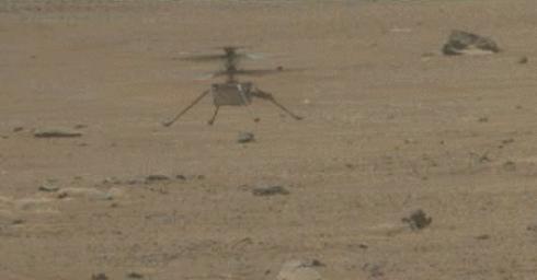 NASA's Ingenuity Mars Helicopter lands with a soft bounce after its fifth flight on May 7, 2021. The images in this GIF were captured by the Mastcam-Z imager aboard NASA's Perseverance rover.