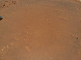 NASA's Ingenuity Mars Helicopter took this color image from an altitude of 33 feet (10 meters) during its fifth flight on May 7, 2021.