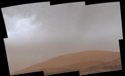 This GIF shows clouds drifting over Mount Sharp on Mars, as viewed by NASA's Curiosity rover on March 19, 2021. Each frame of the scene was stitched together from six individual images.