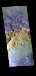 This image from NASA's Mars Odyssey shows part of an unnamed crater located in Terra Sabaea. Dark blue tones in this filter combination indicate basaltic sand.