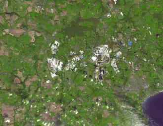 NASA's Terra spacecraft shows the St Austell deposits of china clay (kaolinite) at Tregonning Hill, Cornwall.