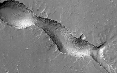 This image acquired on August 2, 2021 by NASA's Mars Reconnaissance Orbiter, shows Gordii Fossae, a volcanic region near Olympus Mons, the planet's largest volcano.