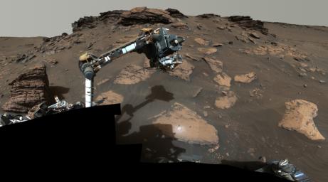 NASA's Perseverance rover puts its robotic arm to work around a rocky outcrop called Skinner Ridge in Mars' Jezero Crater.
