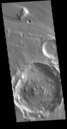 This image from NASA's Mars Odyssey shows Tiu Valles, part of a large system of channels that arise from Vallis Marineris and flow northward to empty into Chryse Planitia.