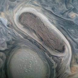 This JunoCam image shows two of Jupiter's large rotating storms, captured on Juno's 38th perijove pass, on November 29, 2021.