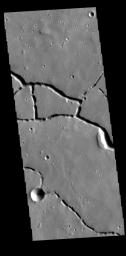 This image from NASA's Mars Odyssey shows the northern portion of Hephaestus Fossae. Hephaestus Fossae is a complex channel system in Utopia Planitia near Elysium Mons.