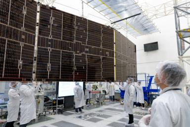 Only one of the 37-foot-long (11.3-meter-long) arrays on NASA's Psyche spacecraft can be unfolded at a time during testing in JPL's High Bay 2 clean room.
