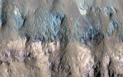 This image acquired on January 6, 2022 by NASA's Mars Reconnaissance Orbiter, shows a crater on the floor of Eos Chasma, part of the Valles Marineris canyon system.