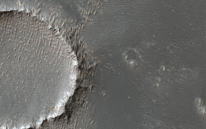 This image acquired on December 5, 2021 by NASA's Mars Reconnaissance Orbiter, shows the southeastern flank of a volcano on Mars called Arsia Mons.