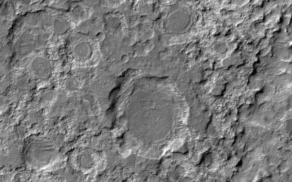 This image acquired on November 9, 2021 by NASA's Mars Reconnaissance Orbiter, shows a variety of dark circular features that are the remains of the layer that has been eroded back from the walls of the craters that formed them.